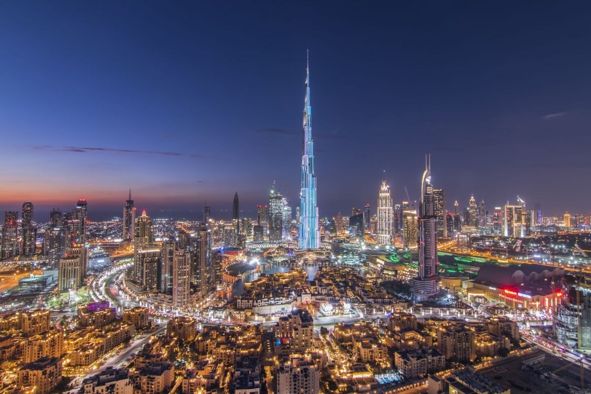 The Burj Khalifa and Dubai skyline glittering at night
